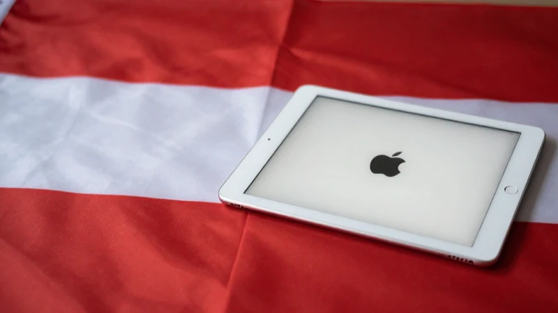 iPad contra fondo de la bandera austriaca