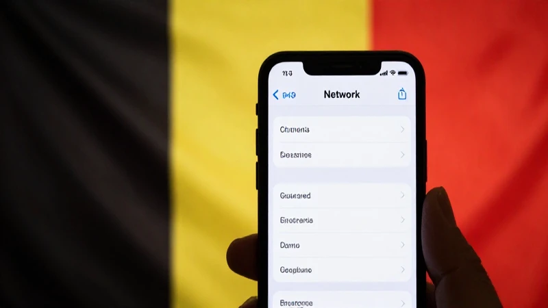 Smartphone con ajustes de red y bandera belga