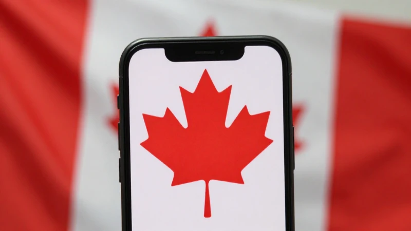 Pantalla móvil con bandera canadiense, luz suave