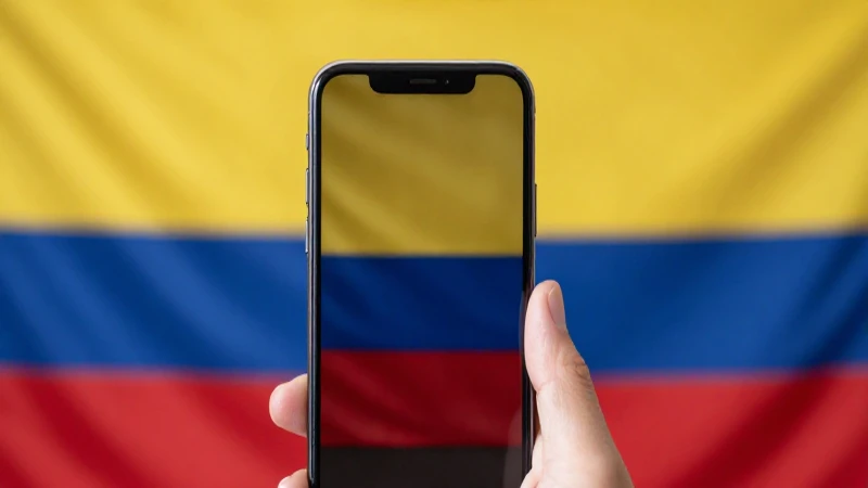 Teléfono iPhone sobre fondo de bandera colombiana