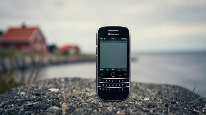 Teléfono BlackBerry contra fondo costero difuminado