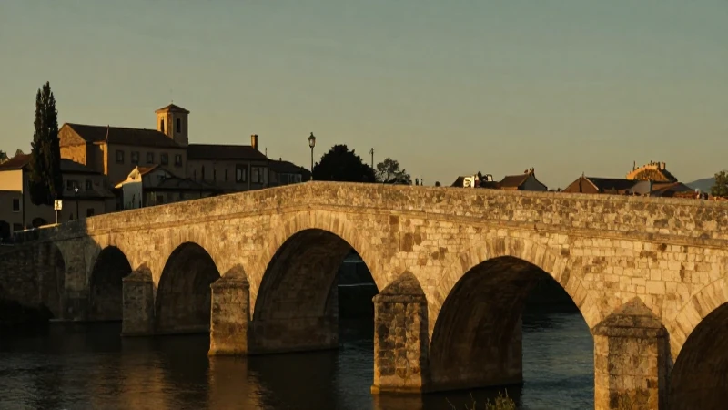 Campo español, puente antiguo, luz dorada