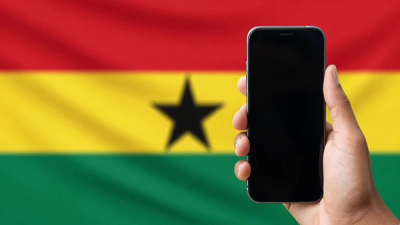 Teléfono Blackberry sobre fondo de la bandera ghanesa