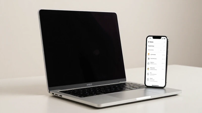 Laptop y móvil resaltados con luz tenue