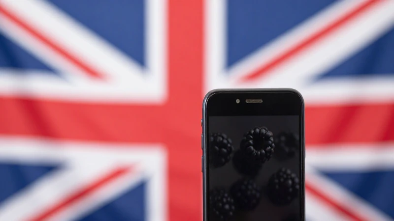 Smartphone negro con fondo de la bandera británica