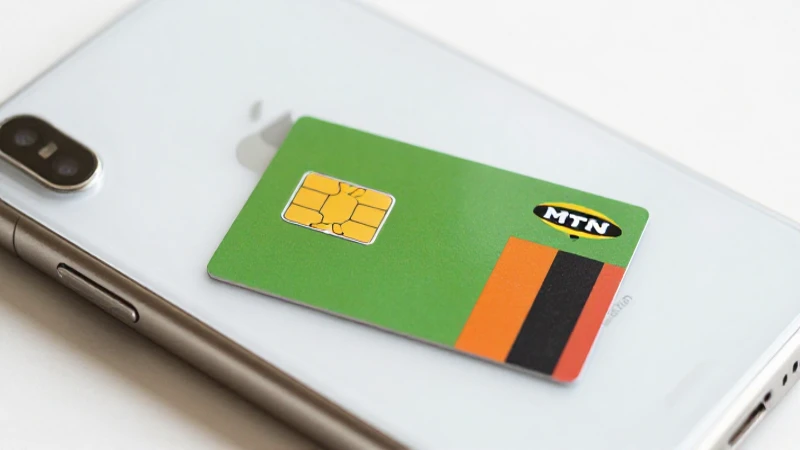 Primer plano de iPhone con tarjeta SIM MTN Zambiana